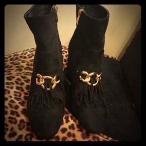 Black trim ankle boots with gold embellishment